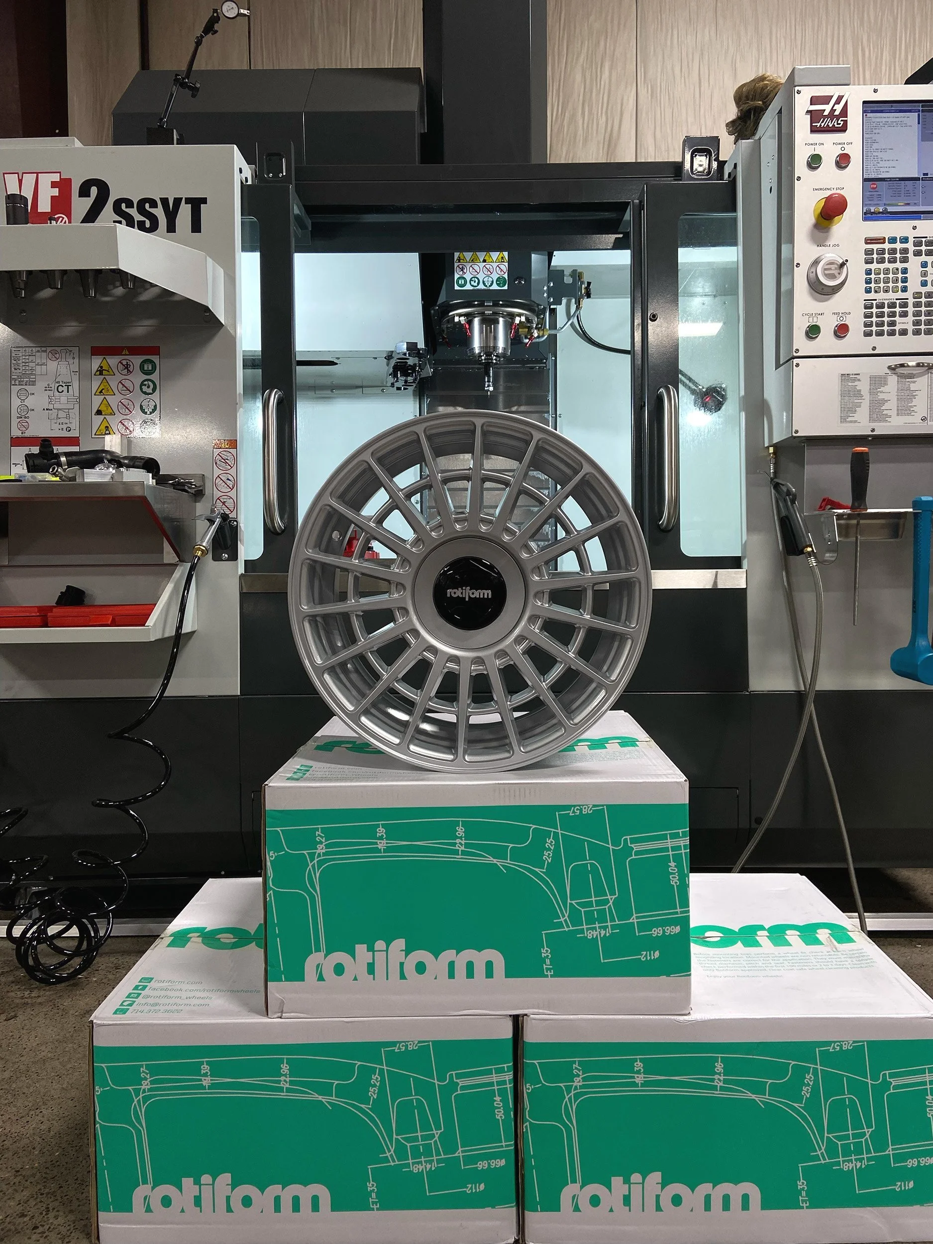 Aftermarket Rotiform wheels ready for installation